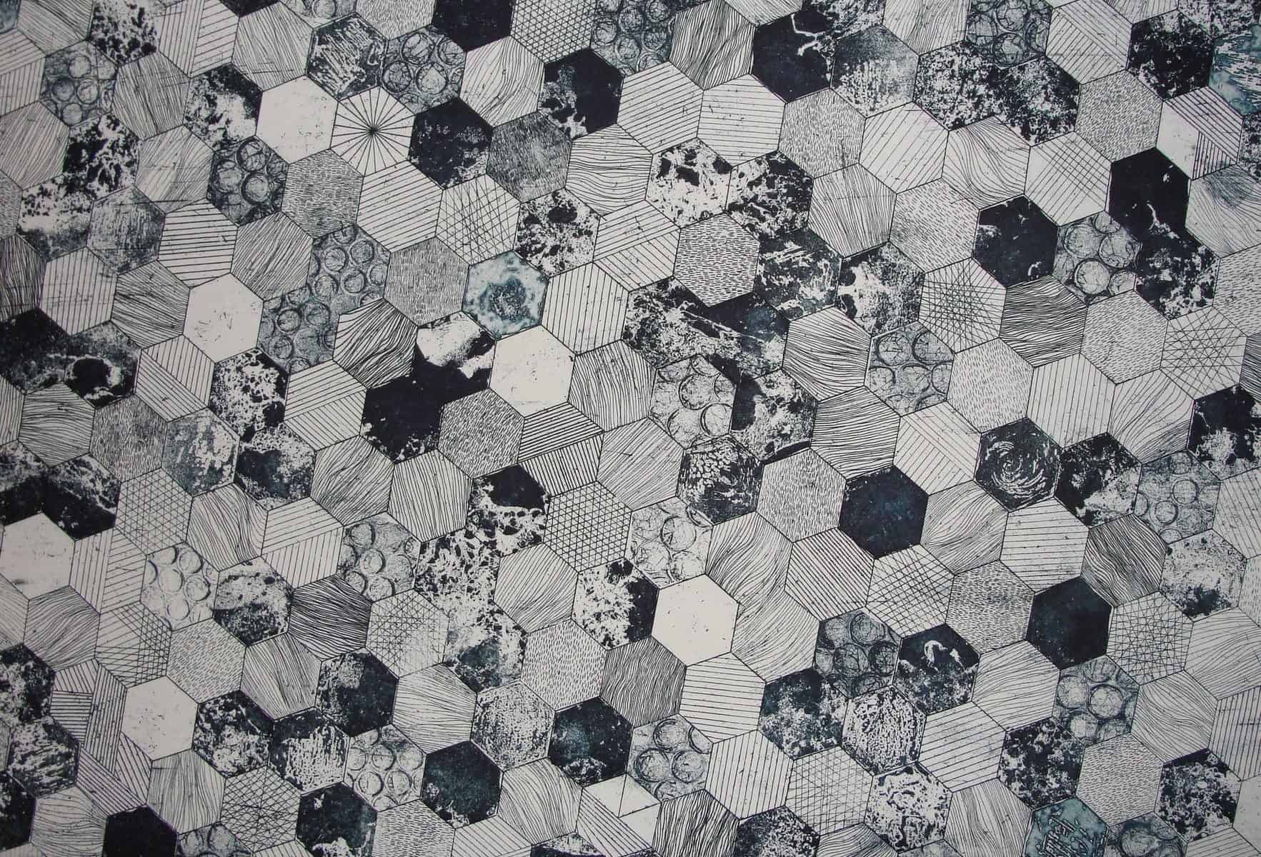 gray and black hive printed textile
